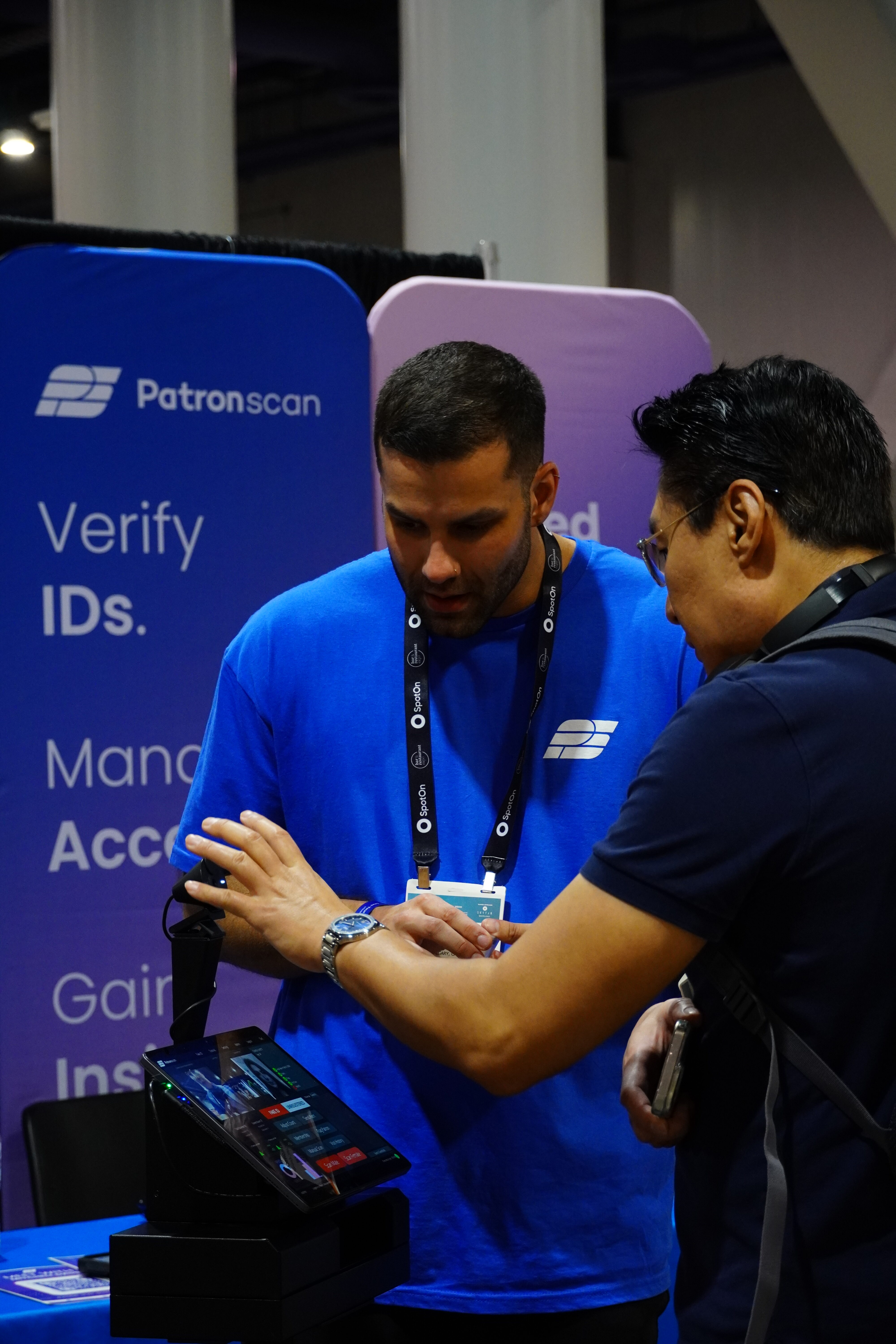 patronscan-worker-and-customer-with-guard+