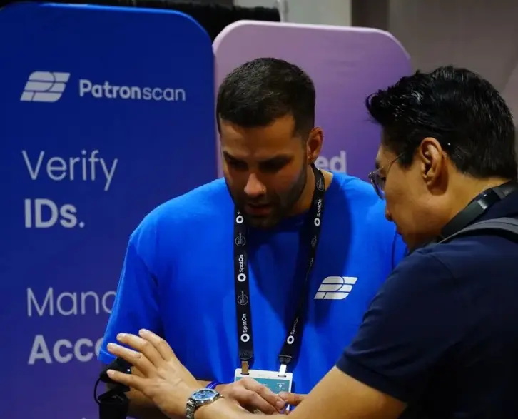 patronscan-worker-and-customer-with-guard+