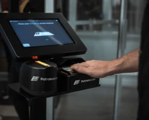 Why Do Bars and Nightclubs Use ID Scanners? A Complete Guide to ID Verification & Venue Safety 1 Person using Patronscan Guard+ ID Scanner Kiosk ID Scanner Forensic ID Scanner